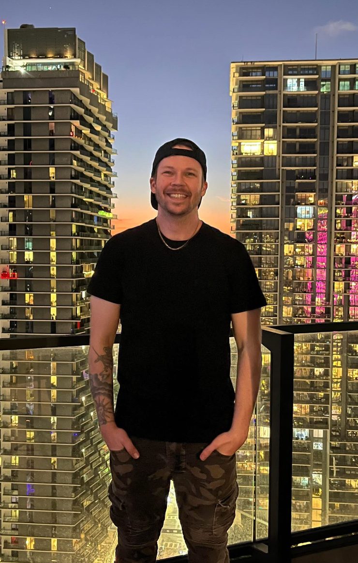 Brett Poe in Miami, representing a modern real estate agent.