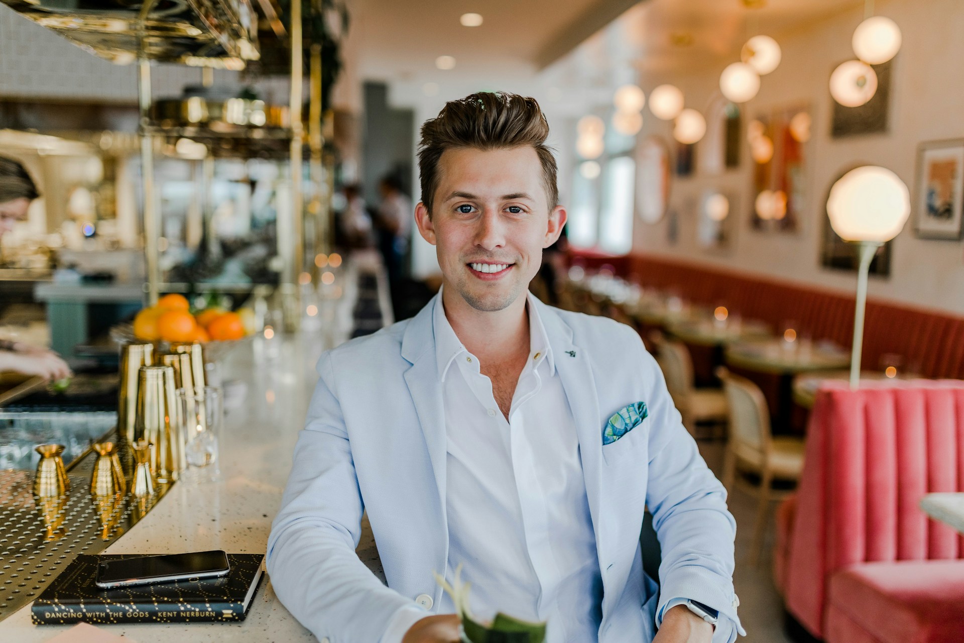 Successful real estate agent in luxury suit symbolizing financial freedom.